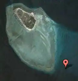 Satellite map showing the precise location of the Eel Garden dive site, a popular spot for muck diving off the coast of Mabul Island.