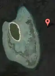 Satellite dive map pinpointing the location of Whitetip Avenue on the eastern wall of Sipadan, a popular site for encountering whitetip reef sharks.