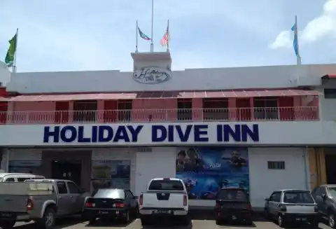 Street-front view of the Holiday Dive Inn in Semporna, a budget hotel providing accommodation for scuba divers and travellers.