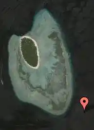 Satellite dive map marking South Point at the southern tip of Sipadan Island's reef.