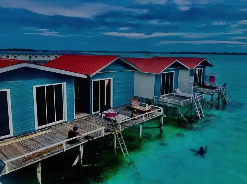 Overwater Chalets View Egang Egang Resort Scenic view of the overwater wooden chalets at Egang Egang Resort