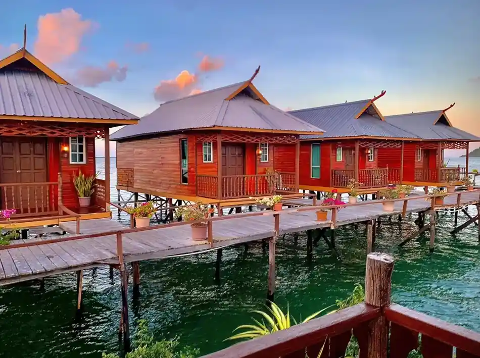 Overwater Chalets View Parapat Water Village Resort Scenic view of wooden overwater chalets Parapat Water Village Resort