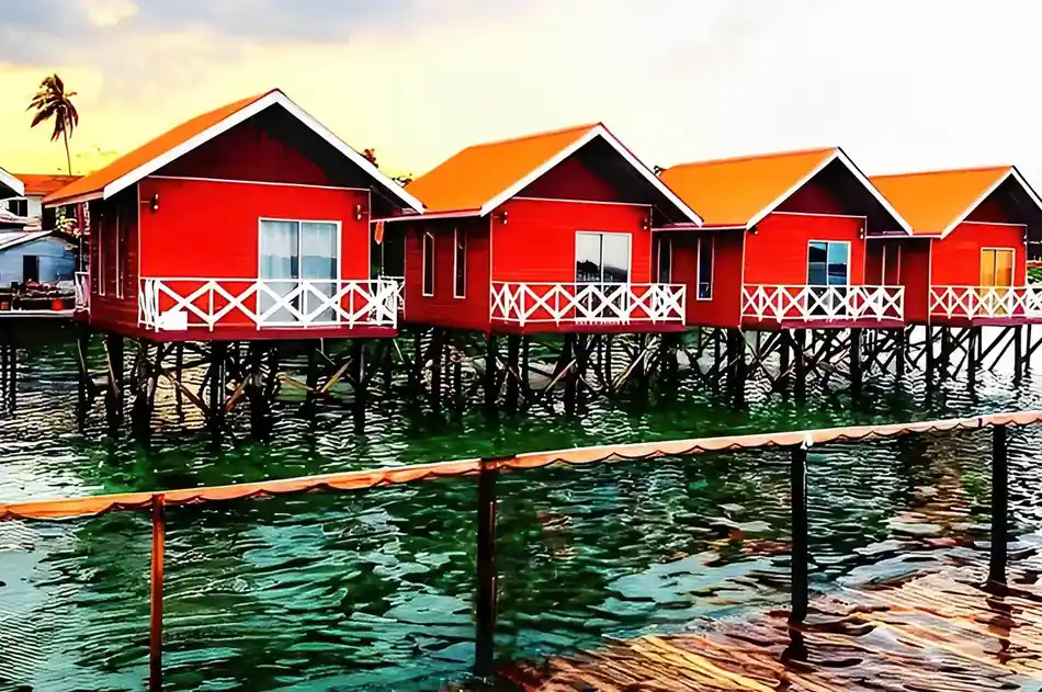 Overwater Chalets View Tampi Tampi Resort Scenic view of the overwater wooden chalets Tampi Tampi Resort